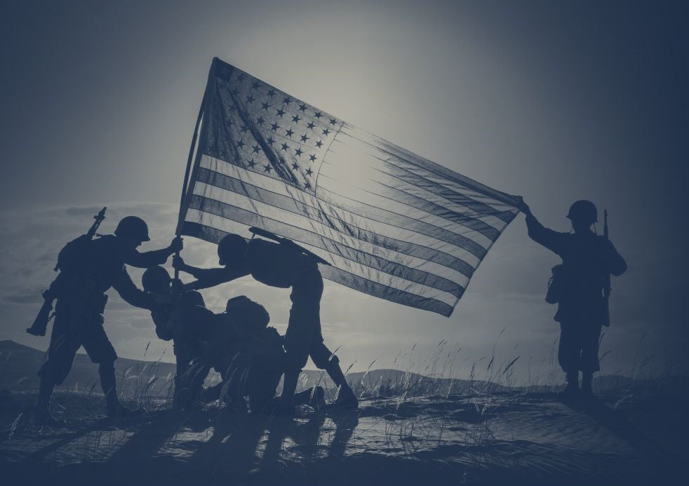 soldiers holding American flag